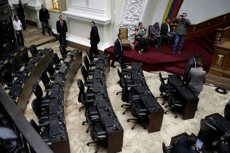 A general view of Venezuela's National Assembly shows empty chairs of deputies of Venezuela's United Socialist Party (PSUV) during a session in Caracas, Venezuela April 5, 2017. REUTERS/Marco Bello