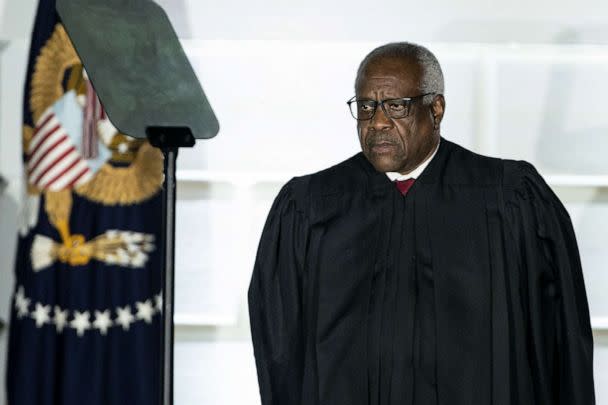 PHOTO: Clarence Thomas, associate justice of the U.S. Supreme Court, listens during a ceremony on the South Lawn of the White House in Washington, D.C., Oct. 26, 2020. (Al Drago/Bloomberg via Getty Images, FILE)