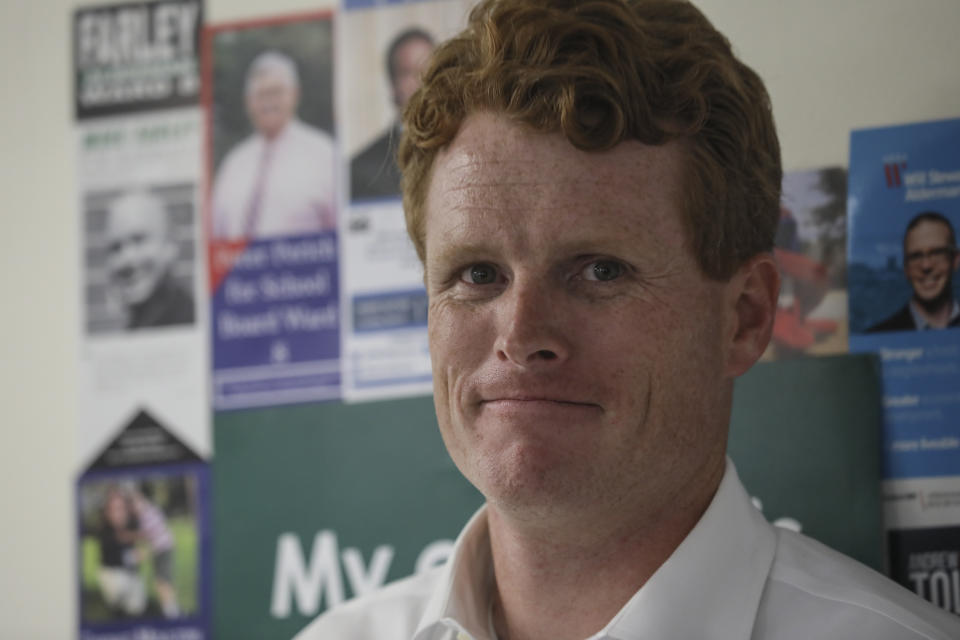 Rep. Joe Kennedy III, D-Mass., smiles at volunteers while waiting to speak about his campaign for Democratic presidential candidate Sen. Elizabeth Warren at the New Hampshire for Warren kick off field office opening in Manchester, N.H. Thursday, Sept. 5, 2019: (AP Photo/ Cheryl Senter)