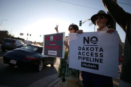 Protesters demonstrate against the Energy Transfer Partners' Dakota Access oil pipeline near the Standing Rock Sioux reservation, in Los Angeles, California, September 13, 2016. REUTERS/Lucy Nicholson