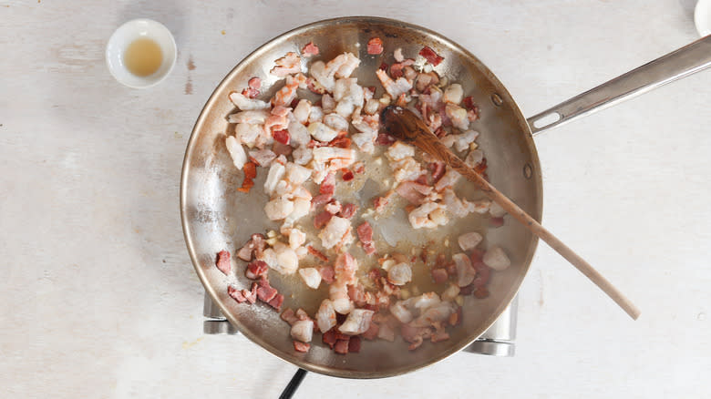 shrimp and pork fat in a pan