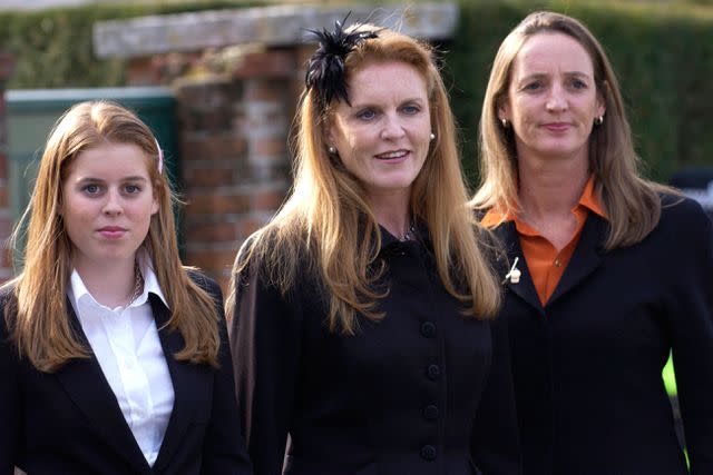 <p>Tim Graham Photo Library via Getty </p> Sarah Ferguson with daughter Princess Beatrice and sister Jane Luedecke