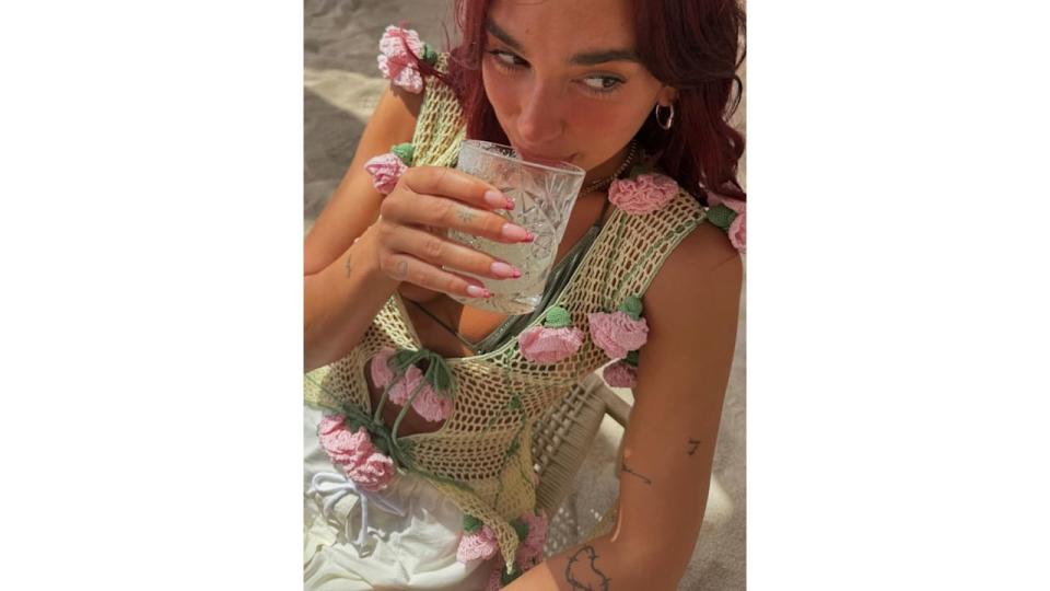 Another of Dua's outfits featured a crocheted top peppered with rose detailing