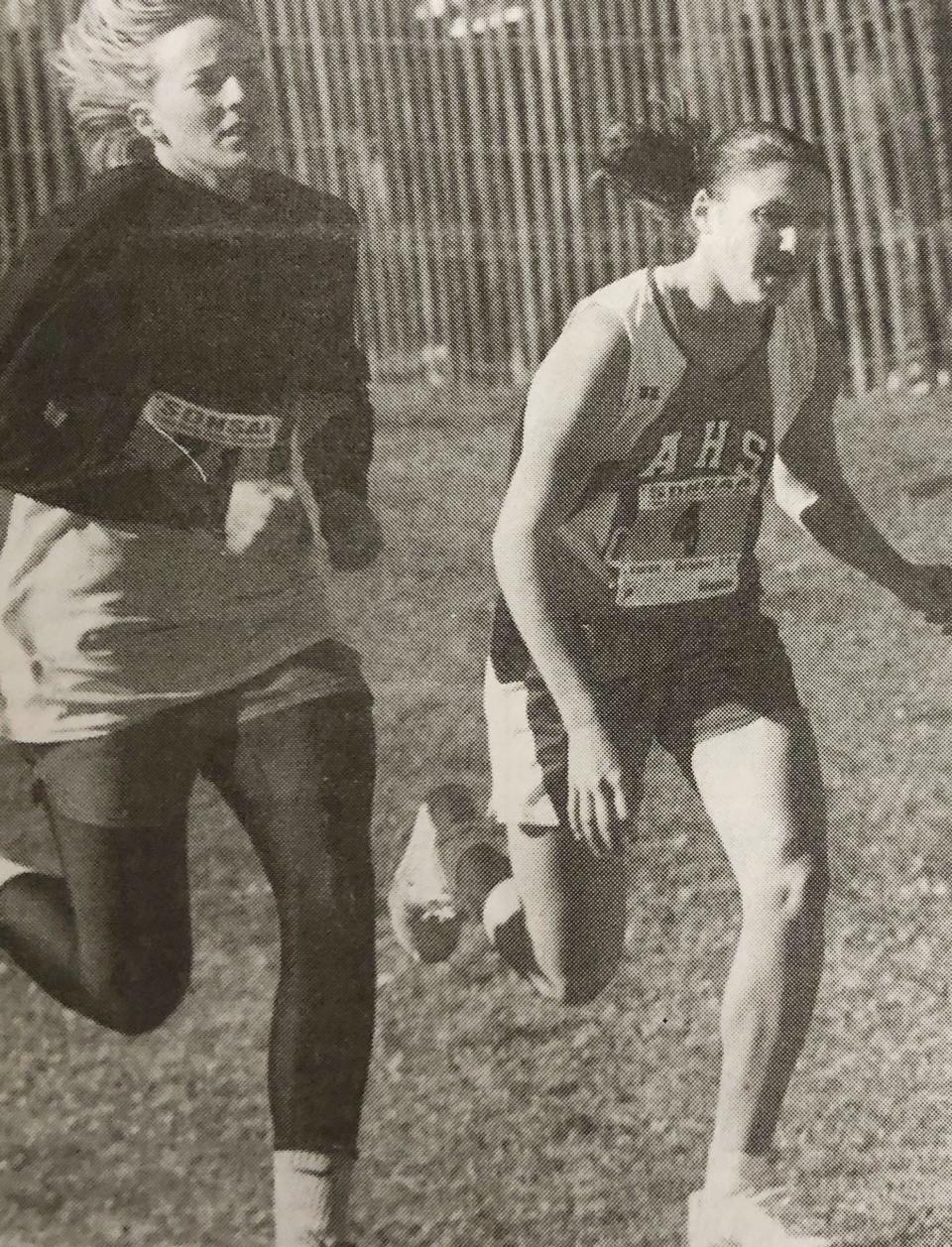 Jeni Chring of Estelline and Kristin Peterson of Arlington near the finish line in the Class B girls' race during the 1999 South Dakota State High School Cross Championships at Huron. Ching finished second and Peterson, chasing an unprecedented fifth state title, took fifth.
