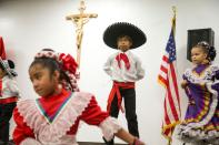 Children take part in a Hispanic Heritage Month event at St. Catherine of Siena Parish Catholic Church in South Phoenix.