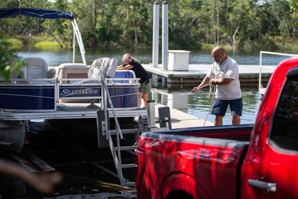 David Keliiheleua loads up his boat at Shields Marina located in St. Marks, Florida, and moves it to higher ground in preparation for Tropical Storm Idalia on Monday, Aug. 28, 2023.