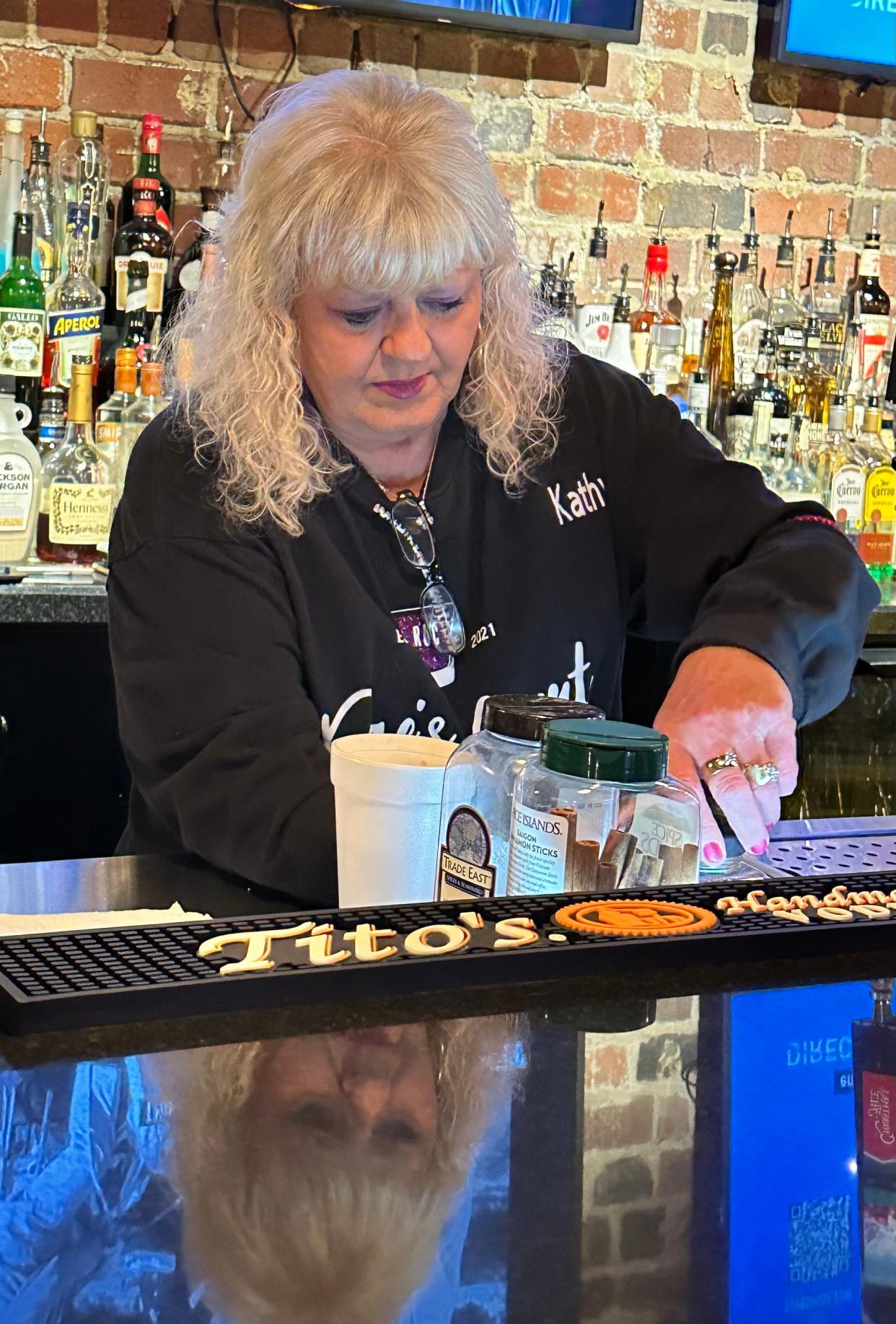 Kathy, a bartender at Rae's on Court in Canton, creates the Frosty the Snowman, a holiday cocktail.