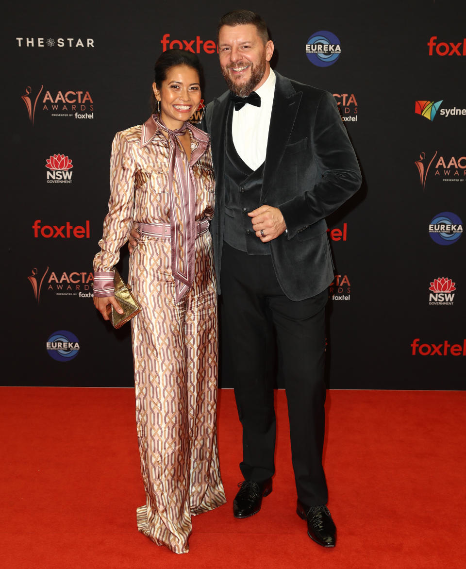 Manu Feildel pictured with his wife Clarissa Weerasena on the AACTA Awards red carpet