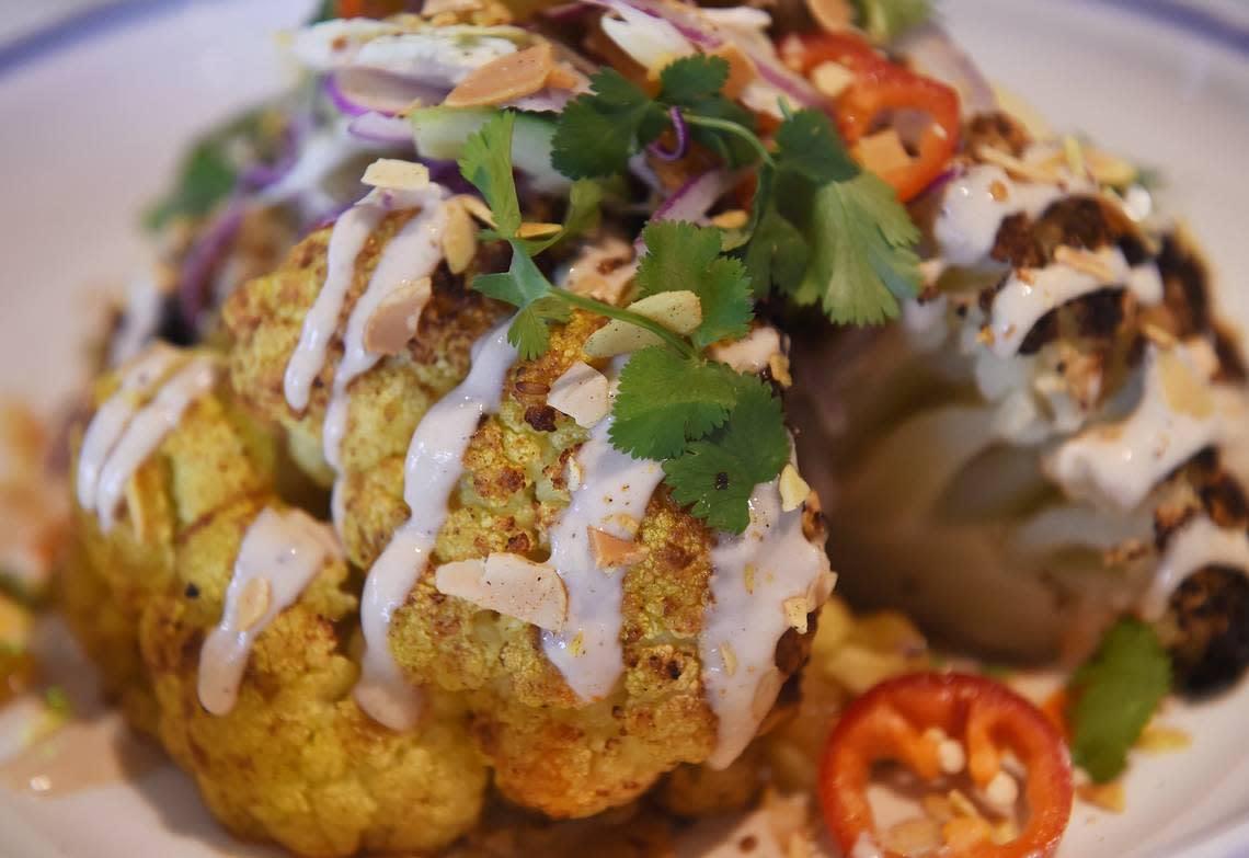 Heirloom’s tandoori cauliflower, drizzled with tahini is featured in this Fresno Bee file photo. The restaurant and its food are the most photographed business in Fresno, according to Yelp.com.