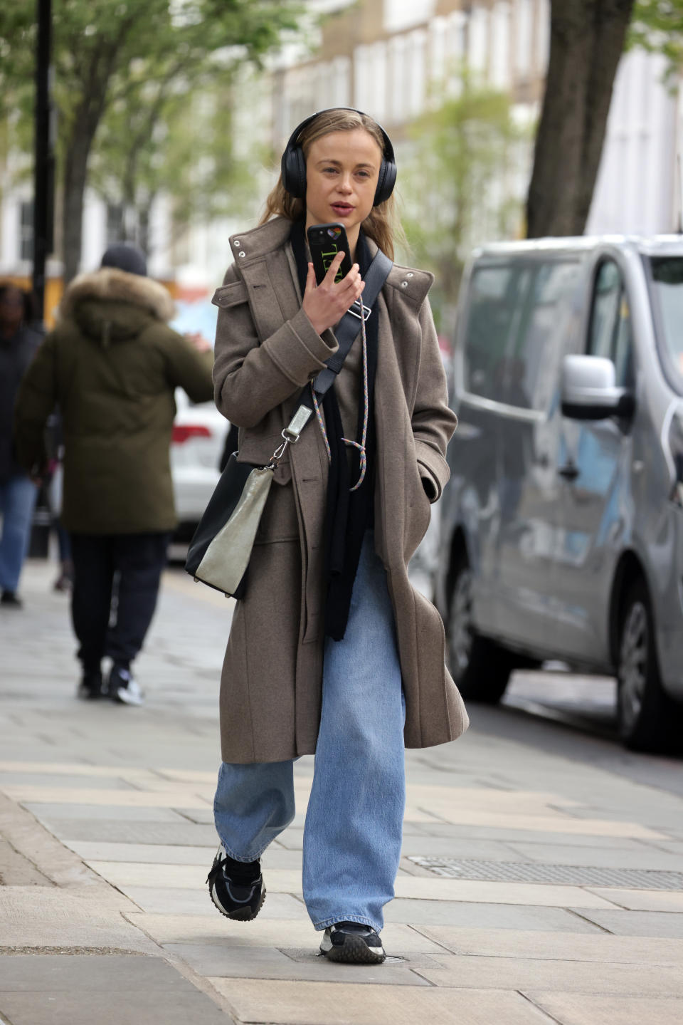 Lady Amelia Windsor in London, England wearing black chunky sneakers