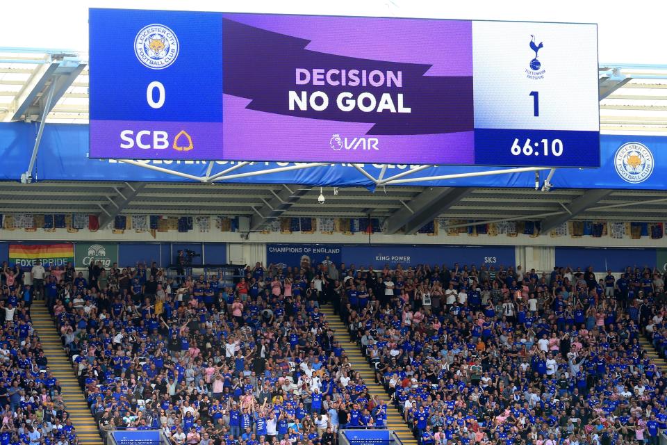 A screen displays the VAR decision to disallow Tottenham Hotspur's Ivorian defender Serge Aurier's (unseen) goal during the English Premier League football match between Leicester City and Tottenham Hotspur at King Power Stadium in Leicester, central England on September 21, 2019. (Photo by Lindsey Parnaby / AFP) / RESTRICTED TO EDITORIAL USE. No use with unauthorized audio, video, data, fixture lists, club/league logos or 'live' services. Online in-match use limited to 120 images. An additional 40 images may be used in extra time. No video emulation. Social media in-match use limited to 120 images. An additional 40 images may be used in extra time. No use in betting publications, games or single club/league/player publications. /         (Photo credit should read LINDSEY PARNABY/AFP/Getty Images)