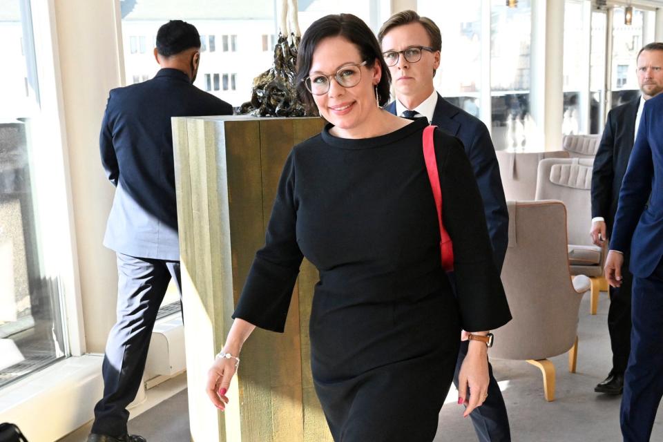 Sweden’s new foreign minister Maria Malmer Stenergard walks after the opening of the parliament in Stockholm, Sweden (AP)