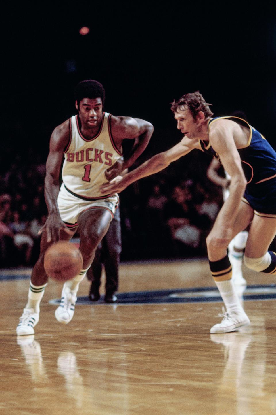 Oscar Robertson of the Milwaukee Bucks handles the ball against the Golden State Warriors during a game in 1971 at the MECCA Arena in Milwaukee.