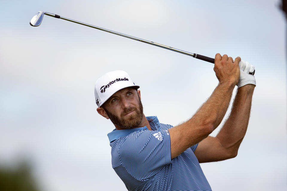 Dustin Johnson tees off on the fourth hole during the first round of the 3M Open golf tournament in Blaine, Minn., Thursday, July 23, 2020. (AP Photo/Andy Clayton- King)