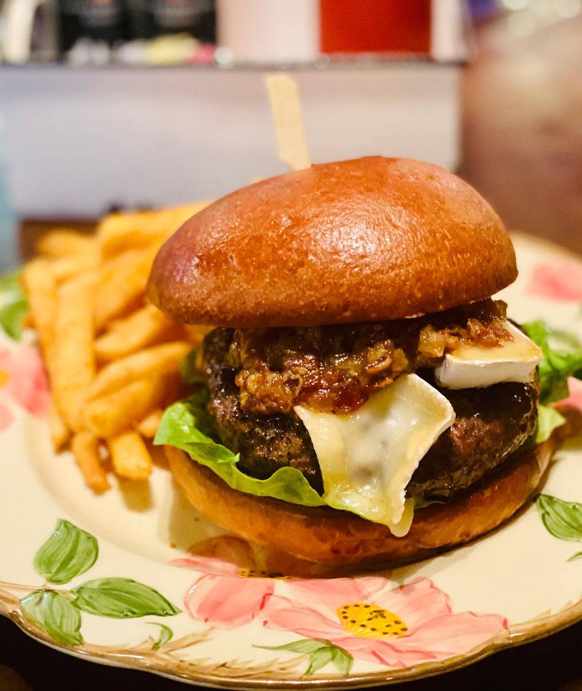 Lost and Found Key West’s Last Request Burger features brie and onion bacon jam on a brioche bun.