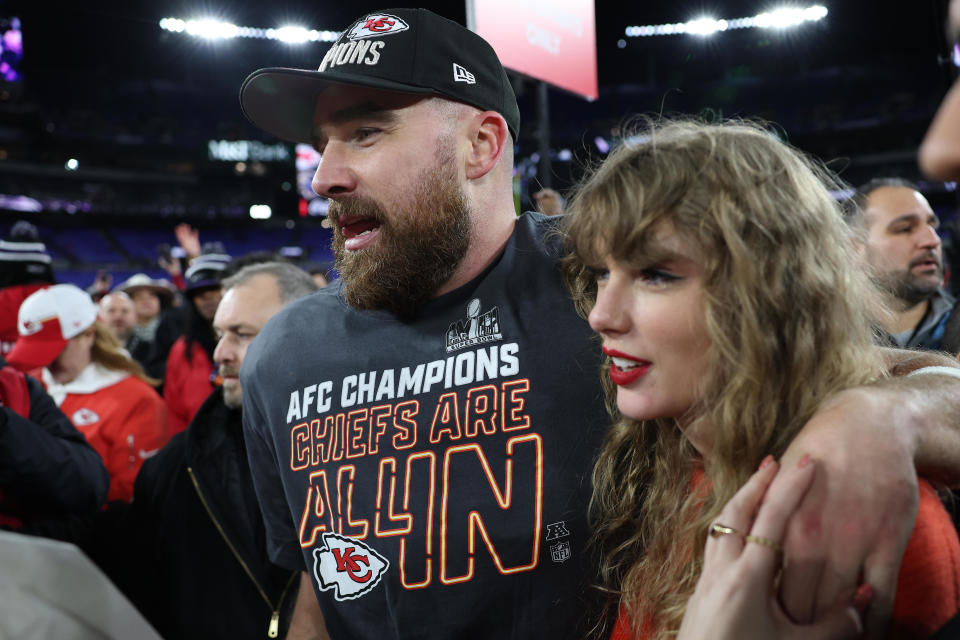 Kansas City Chiefs tight end Travis Kelce celebrates with Taylor Swift after a 17-10 victory against the Baltimore Ravens in the AFC Championship Game on Jan. 28, 2024 in Baltimore. / Credit: Patrick Smith/Getty Images