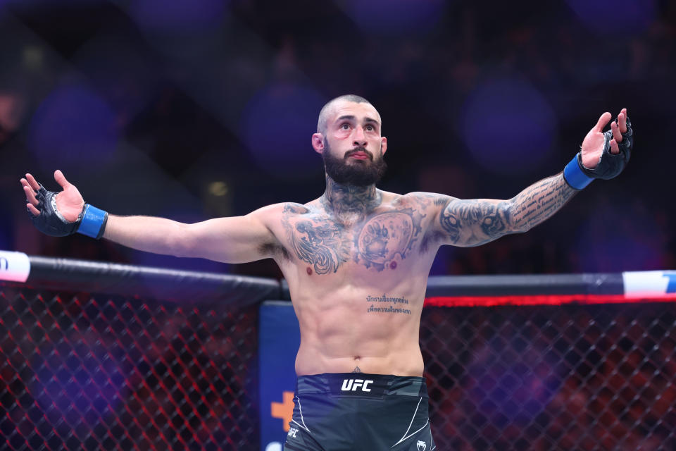 May 6, 2023; Newark, New Jersey, USA; Charles Jourdain (blue gloves)reacts after defeating Kron Gracie (red gloves) during UFC 288 at Prudential Center. Mandatory Credit: Ed Mulholland-USA TODAY Sports