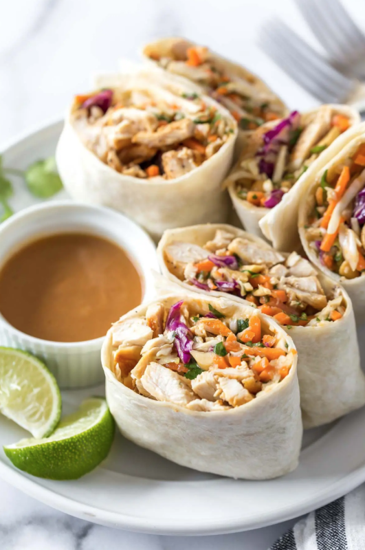 <p>Simply Whisked</p><p>These easy, peanut chicken wraps are a simple and healthy lunch recipe, but they're delicious any time of day.</p><p><strong>Get the recipe: <a href="https://www.simplywhisked.com/asian-chicken-wraps/" rel="nofollow noopener" target="_blank" data-ylk="slk:Asian Chicken Wraps;elm:context_link;itc:0;sec:content-canvas" class="link rapid-noclick-resp"><em>Asian Chicken Wraps</em></a></strong></p>