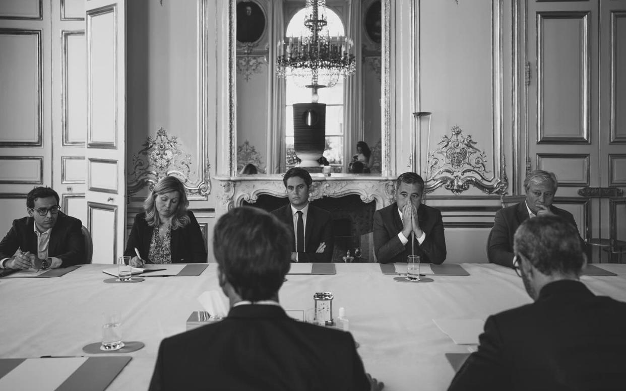 The black and white photograph captures the moment the French president told his cabinet he was dissolving parliament