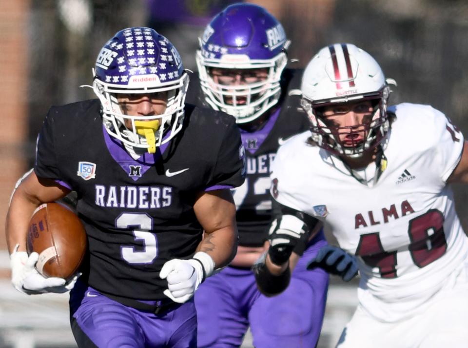 Mount Union running back DeAndre Parker runs the ball for a gain in the fourth quarter of Mount Union vs Alma in NCAA Division III playoff at Mount Union. Saturday, November 25, 2023.