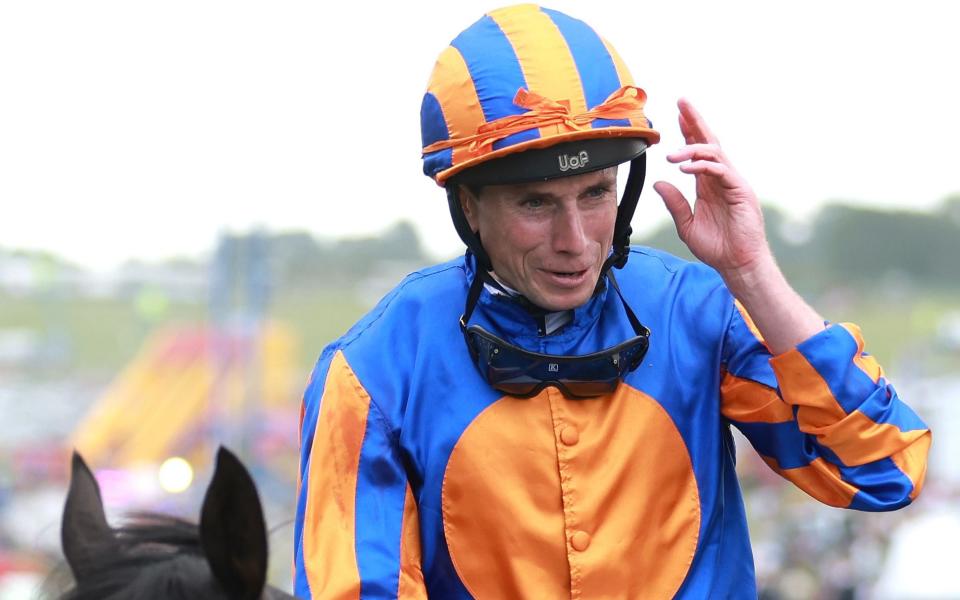 Ryan Moore celebrates riding Auguste Rodin to victory in The Betfred Derby during Derby Day at Epsom Downs Racecourse on June 03, 2023 in Epsom - Getty Images/Warren Little