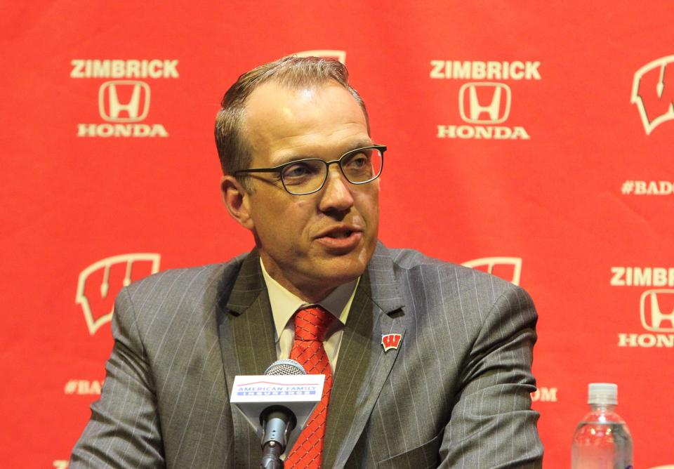 University of Wisconsin athletic director Chris McIntosh answers a question during a press conference that announced his hired on Wednesday June 2, 2021 at the Kohl Center in Madison, Wis.