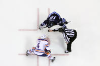 WINNIPEG, CANADA - FEBRUARY 27: Taylor Hall #4 of the Edmonton Oilers gets set for a first-period faceoff against Bryan Little #18 of the Winnipeg Jets at the MTS Centre on February 27, 2012 in Winnipeg, Manitoba, Canada. (Photo by Jonathan Kozub/NHLI via Getty Images)