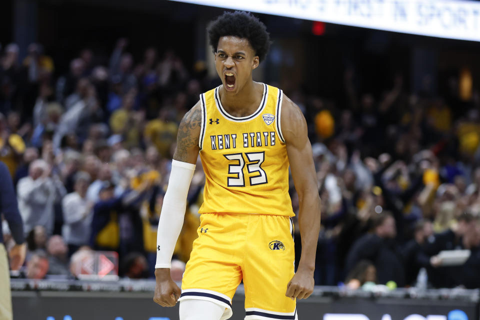 Kent State forward Miryne Thomas celebrates during the second half of an NCAA college basketball game against Toledo for the championship of the Mid-American Conference Tournament, Saturday, March 11, 2023, in Cleveland. (AP Photo/Ron Schwane)