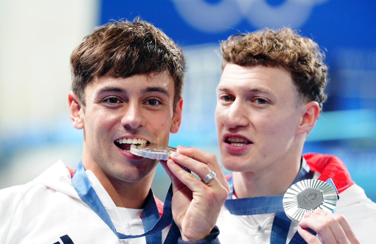 Great Britain's Tom Daley and Noah Williams with their silver medals following the Men's Synchronised 10m Platform Final at the Aquatics Centre on the third day of the 2024 Paris Olympic Games in France. Picture date: Monday July 29, 2024. (Photo by Mike Egerton/PA Images via Getty Images)