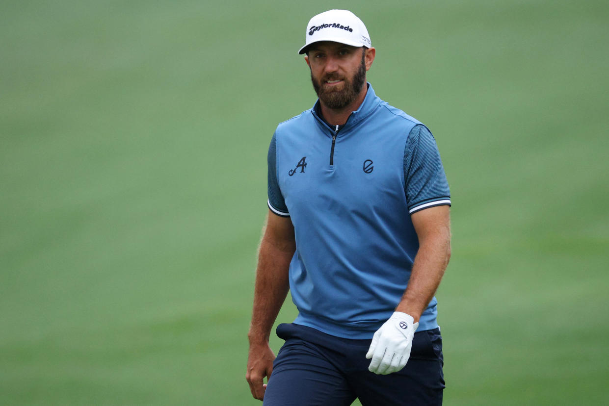 Golf - The Masters - Augusta National Golf Club - Augusta, Georgia, U.S. - April 3, 2023  Dustin Johnson of the U.S. wearing a 4Aces GC team logo for his LIV Golf team on the 10th hole during a practice round REUTERS/Brian Snyder