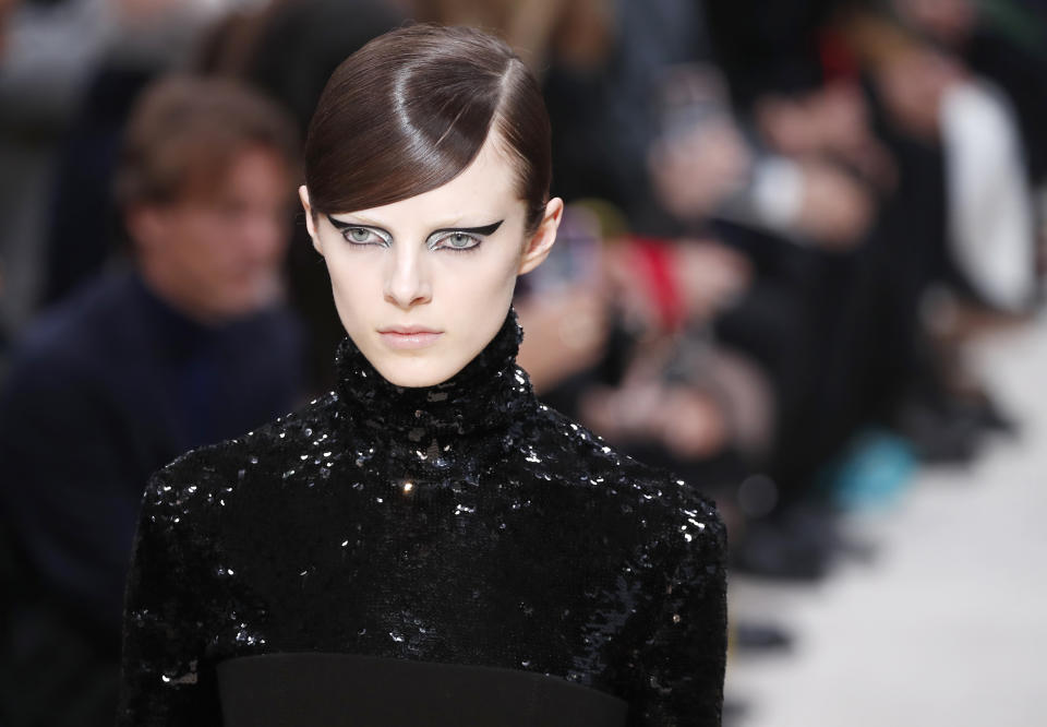 A model wears a creation for the Valentino fashion collection during Women's fashion week Fall/Winter 2020/21 presented in Paris, Sunday, March 1, 2020. (AP Photo/Francois Mori)