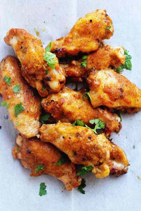 <p>Grandbaby Cakes</p><p>This Mango Jerk Wings recipe pairs a nuanced jerk flavor with the tropical sweetness of mangoes. You will never make wings another way again! </p><p><strong>Get the Recipe: </strong><strong><a href="https://grandbaby-cakes.com/mango-jerk-wings/" rel="nofollow noopener" target="_blank" data-ylk="slk:Mango Jerk Wings;elm:context_link;itc:0;sec:content-canvas" class="link ">Mango Jerk Wings</a></strong></p>