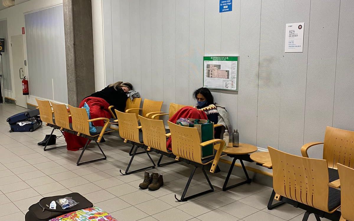 Passengers were forced to sleep overnight in an unused arrivals hall - Telegraph