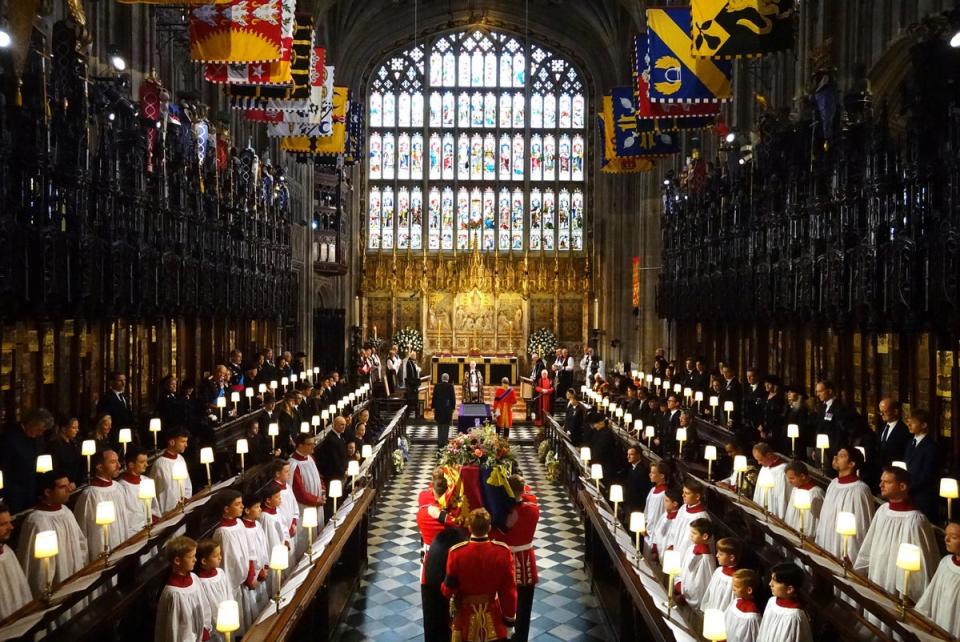 The coffin of Queen Elizabeth II is carried into St George’s Chapel (PA)