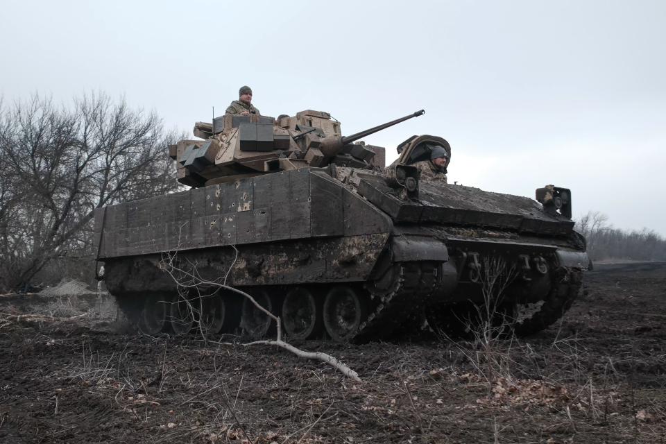 Ukrainian soldiers of 47th Mechanized Brigade on M2 Bradley infantry fighting vehicle on Avdiivka direction on February 23, 2024 in Donetsk Oblast, Ukraine.