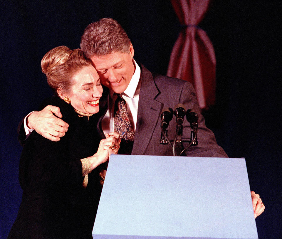 Presidential candidate Bill Clinton hugs his wife at his primary night party in Merrimack, New Hampshire, on Feb. 18, 1992. Clinton placed second in the primary behind Paul Tsongas and declared himself the "Comeback Kid." (Photo: Ron Frehm/ASSOCIATED PRESS)