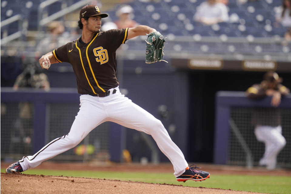 San Diego Padres' You Darvish pitches in the first inning of a spring training baseball game against the Kansas City Royals, Sunday, March 7, 2021, in Peoria, Ariz. (AP Photo/Sue Ogrocki)