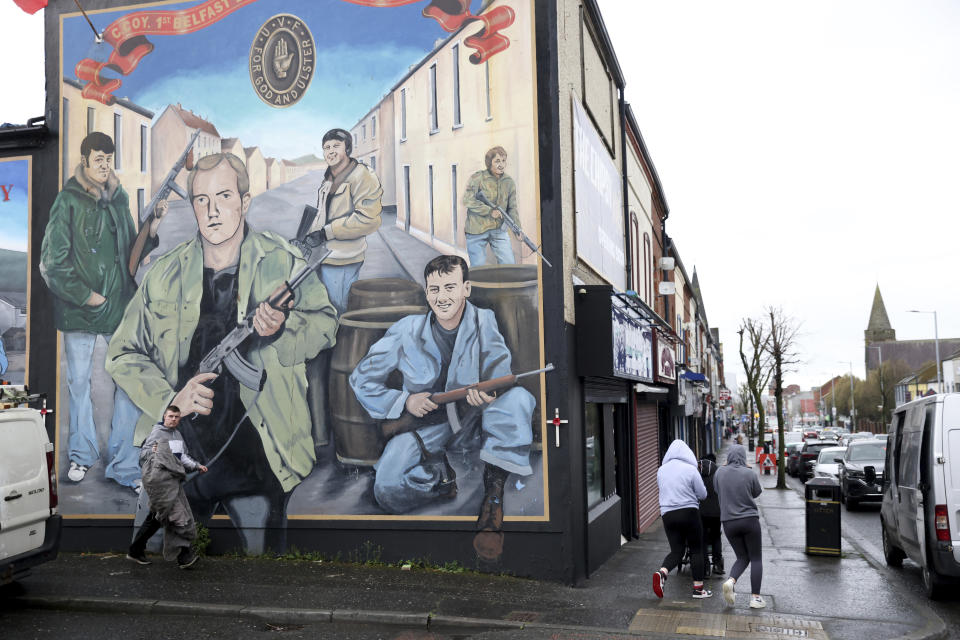 A loyalist mural is seen on a wall in west Belfast, Northern Ireland, Wednesday, April 5, 2023. It has been 25 years since the Good Friday Agreement largely ended a conflict in Northern Ireland that left 3,600 people dead. (AP Photo/Peter Morrison)