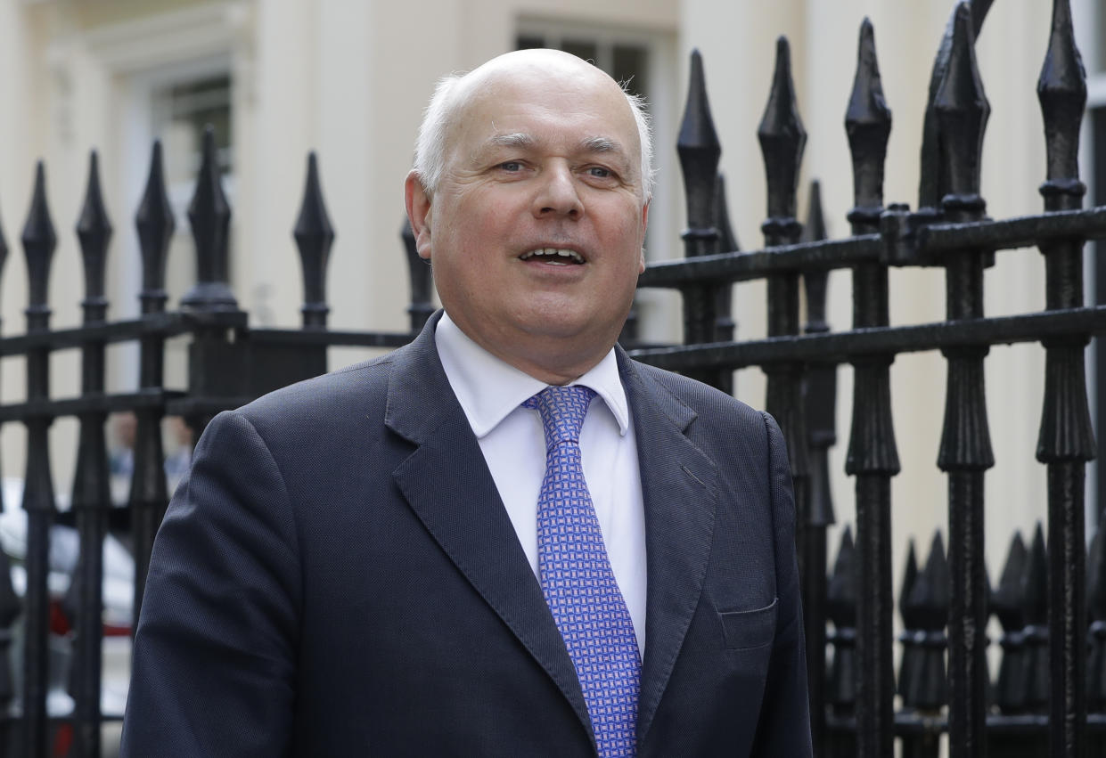 Former leader of Britain's Conservative Party Iain Duncan Smith arrives as Conservative Party lawmaker Boris Johnson prepares to launch his leadership campaign, in London, Wednesday June 12, 2019. Boris Johnson solidified his front-runner status in the race to become Britain's next prime minister on Tuesday, gaining backing from leading pro-Brexit lawmakers.(AP Photo/Kirsty Wigglesworth)