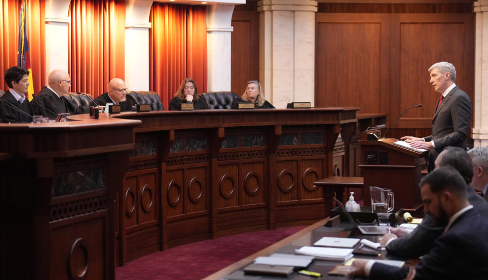 FILE - Attorney Eric Olson, far right, argues before the Colorado Supreme Court on Wednesday, Dec. 6, 2023, in Denver. The Colorado Supreme Court on Tuesday, Dec. 19, declared former President Donald Trump ineligible for the White House under the U.S. Constitution’s insurrection clause and removed him from the state’s presidential primary ballot, setting up a likely showdown in the nation’s highest court to decide whether the front-runner for the GOP nomination can remain in the race. (AP Photo/David Zalubowski, Pool)