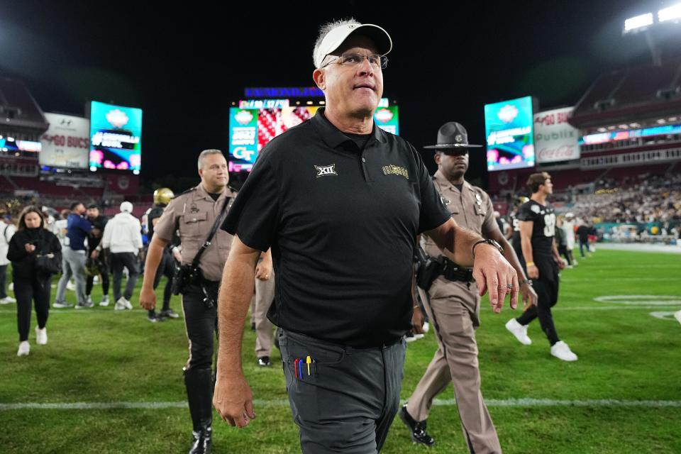 Dec 22, 2023; Tampa, FL, USA; UCF Knights head coach Gus Malzahn walks off the field after being defeated by the Georgia Tech Yellow Jackets in the Gasparilla Bowl at Raymond James Stadium. Mandatory Credit: Jasen Vinlove-USA TODAY Sports