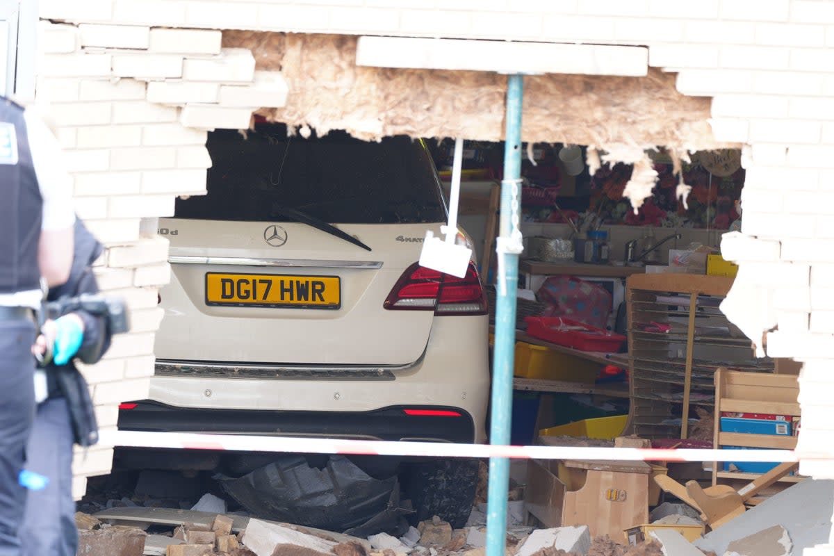 Debris and damage to the Beacon Church of England Primary School, in Anfield, Liverpool, after a car crashed into the building (Peter Byrne/PA) (PA Wire)