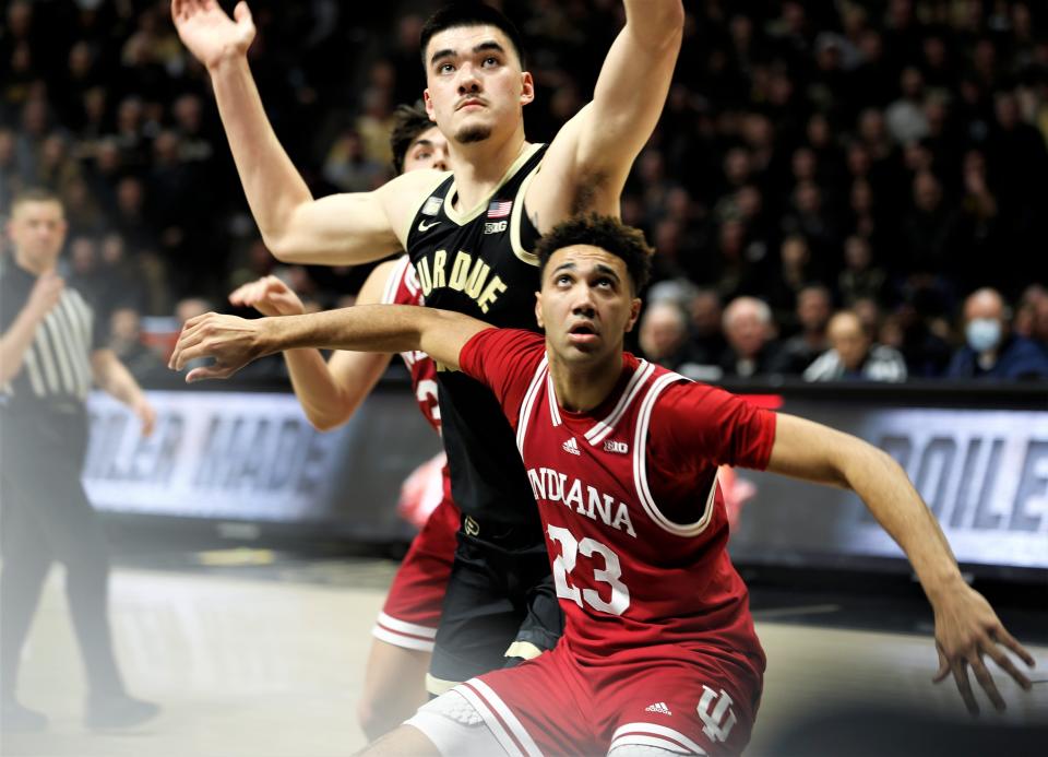 Purdue junior Zach Edey and Indiana senior Trayce Jackson-Davis battle for a rebound during a game Feb. 25, 2023.