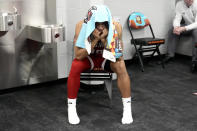 North Carolina State guard Breon Pass sits on the locker room after the NCAA college basketball game against Purdue at the Final Four, Saturday, April 6, 2024, in Glendale, Ariz. (AP Photo/Brynn Anderson )
