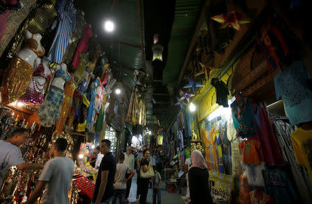 People walk around shops at al-Hussein and Al-Azhar districts in old Islamic Cairo, Egypt August 18, 2016. Picture taken August 18, 2016. REUTERS/Amr Abdallah Dalsh