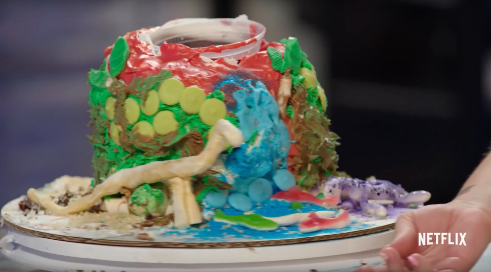 Some fo the baked goods end up being hilarious, including this dinosaur cake that looked nothing like the original. Source: Netflix