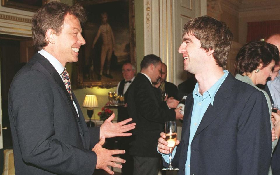 Cool Britannia: Oasis star Noel Gallagher meets Tony Blair at No 10 in 1997 - Rebecca Naden/PA Wire