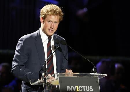 Britain's Prince Harry speaks at the opening ceremony of the Invictus Games at the Queen Elizabeth Park in east London September 10, 2014.REUTERS/Luke MacGregor