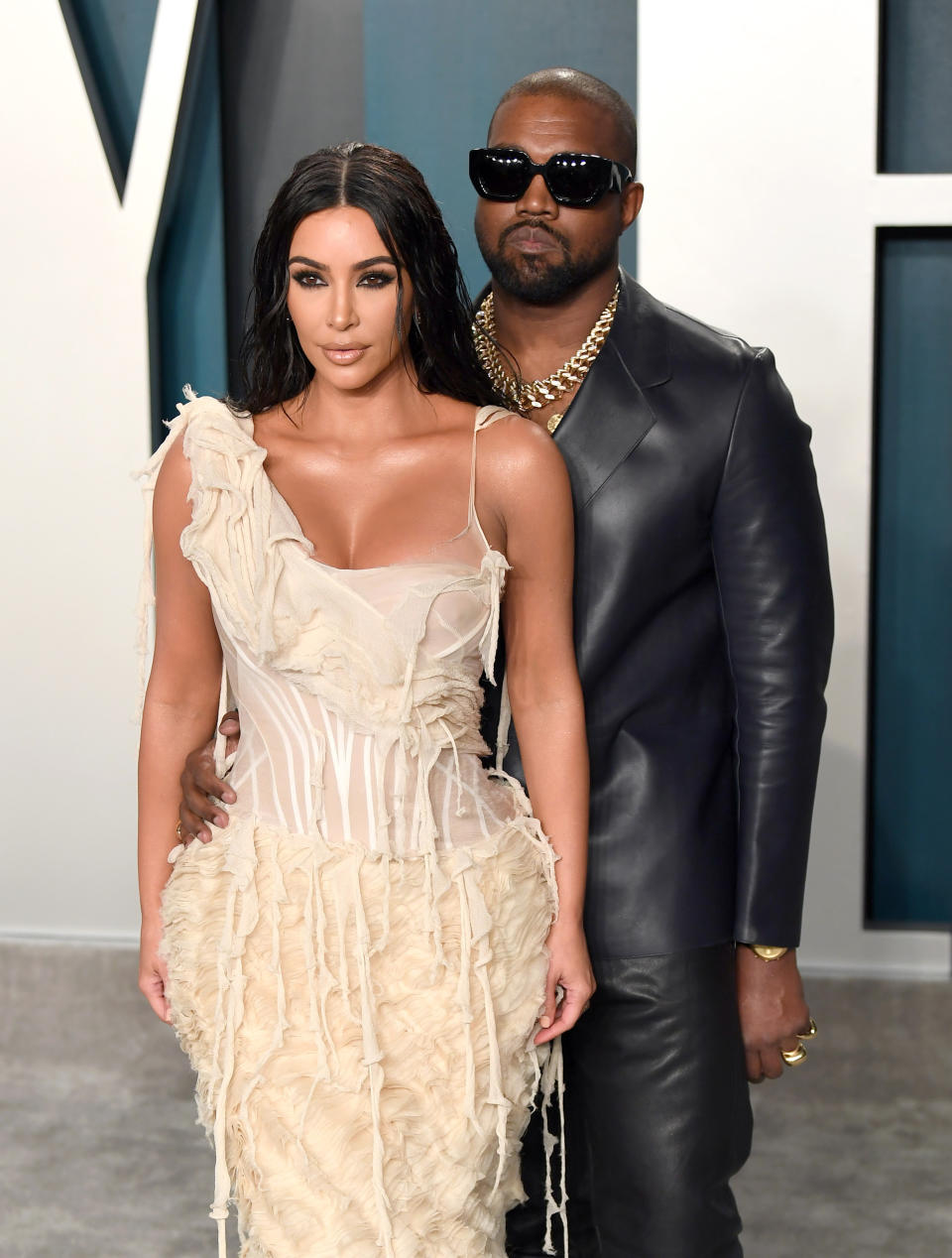 Kim and Ye at a media event