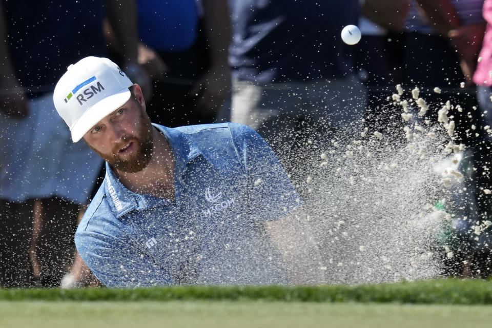 Chris Kirk hits from a bunker onto the third green during the final round of the Honda Classic golf tournament, Sunday, Feb. 26, 2023, in Palm Beach Gardens, Fla. (AP Photo/Lynne Sladky)